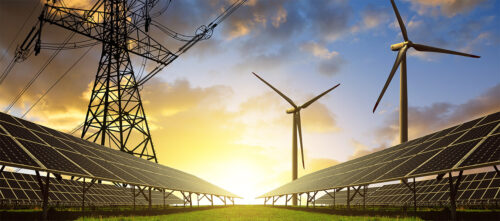 Solar, wind power, and power lines together on a field
