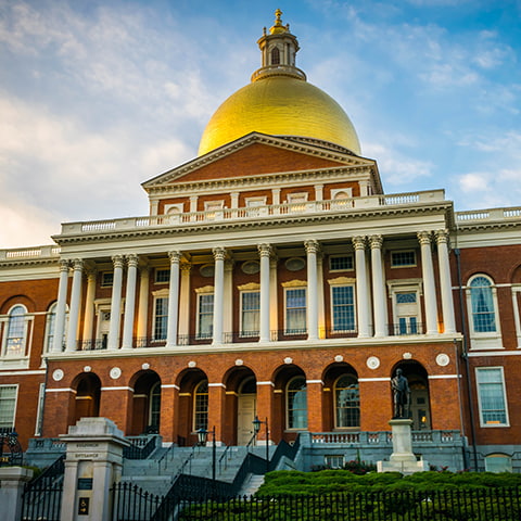 The Massachusetts state capitol building on a sunny day.