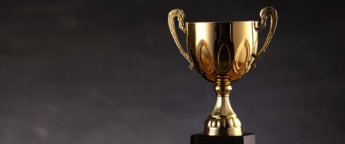A trophy against a dark background